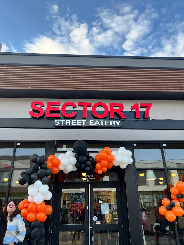 Aloo Tikki Noodle Burger — signature Desi burger at Sector 17 Sage Hill Calgary